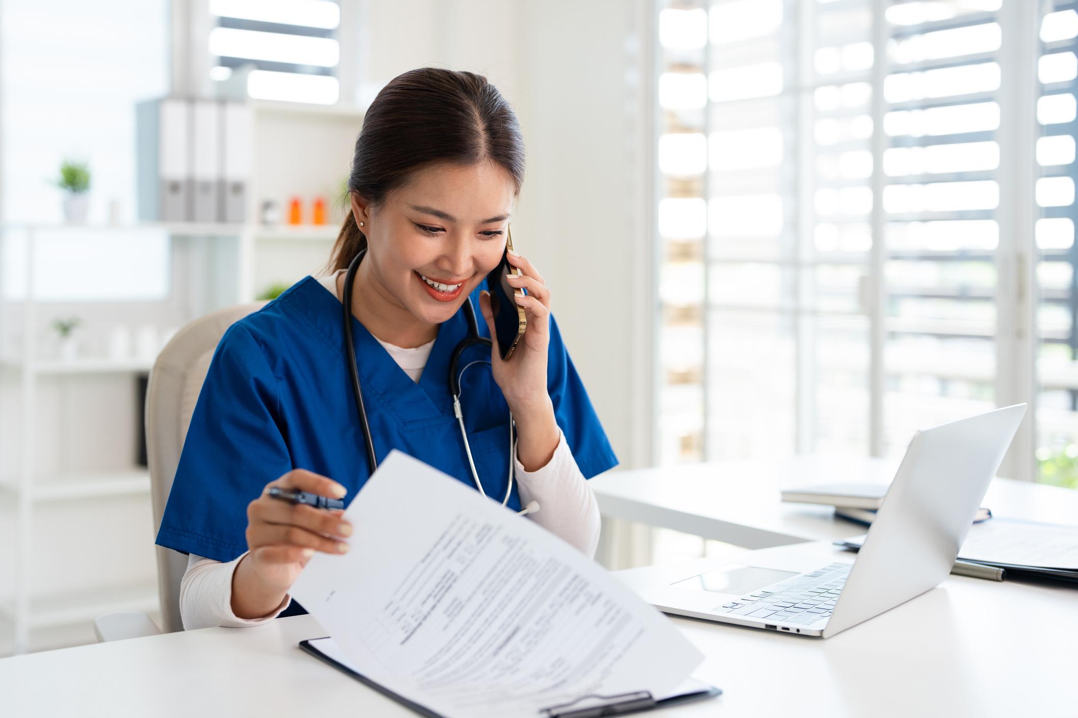 Care coordinator on a phone call with a family